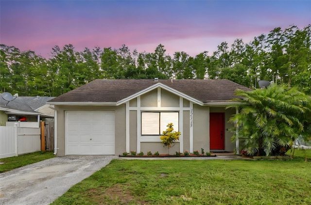 12315 Hidden Brook Dr, Tampa, FL 33624 - view of front facade with stucco siding, asphalt driveway, a garage, and a shingled roof