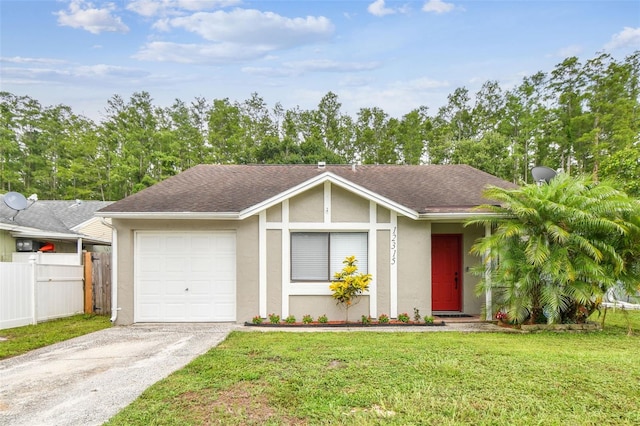 12315 Hidden Brook Dr, Tampa, FL 33624 - mid-century home featuring stucco siding, asphalt driveway, and roof with shingles