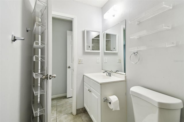 12315 Hidden Brook Dr, Tampa, FL 33624 - bathroom featuring vanity and tile patterned floors