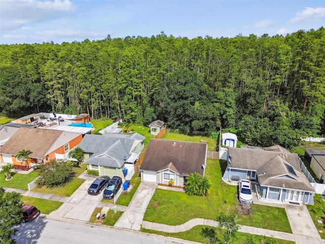 12315 Hidden Brook Dr, Tampa, FL 33624 - aerial perspective of suburban area with a forest