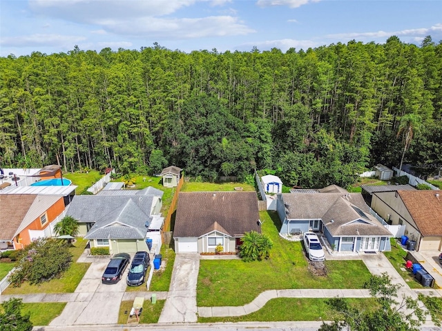 12315 Hidden Brook Dr, Tampa, FL 33624 - aerial view of residential area featuring a heavily wooded area