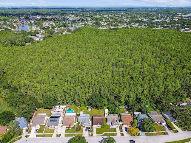 12315 Hidden Brook Dr, Tampa, FL 33624 - aerial overview of property's location featuring a forest and nearby suburban area