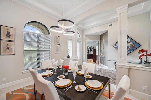 1042 Tuscany Dr, Trinity, FL 34655 - dining room with decorative columns, ornamental molding, and arched walkways