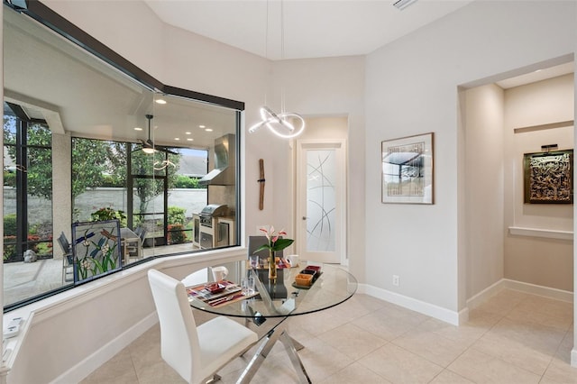 1042 Tuscany Dr, Trinity, FL 34655 - dining area featuring light tile patterned floors