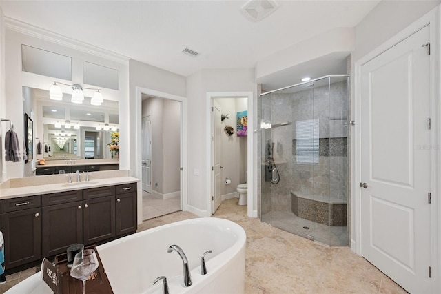 1042 Tuscany Dr, Trinity, FL 34655 - full bathroom featuring a shower stall, vanity, a bath, and tile patterned floors