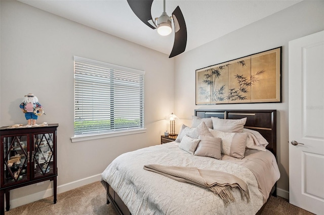1042 Tuscany Dr, Trinity, FL 34655 - carpeted bedroom with baseboards and ceiling fan