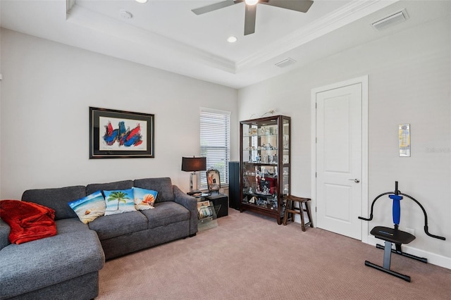 1042 Tuscany Dr, Trinity, FL 34655 - living room with carpet flooring, a tray ceiling, ceiling fan, ornamental molding, and recessed lighting