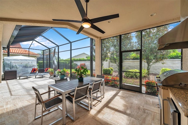 1042 Tuscany Dr, Trinity, FL 34655 - sunroom / solarium with outdoor dining area, a ceiling fan, and healthy amount of natural light