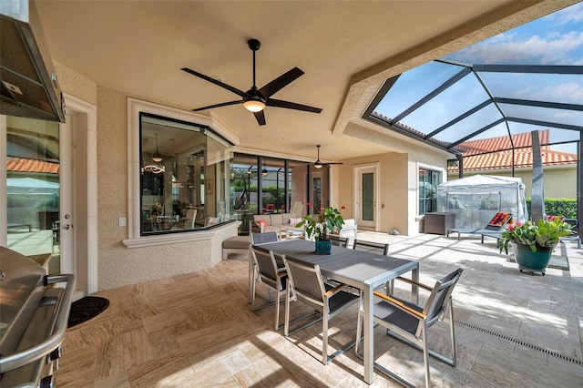 1042 Tuscany Dr, Trinity, FL 34655 - view of patio featuring outdoor dining area, ceiling fan, and a lanai