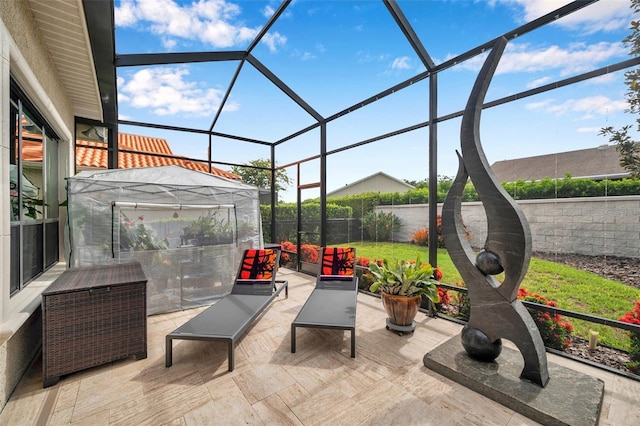 1042 Tuscany Dr, Trinity, FL 34655 - fenced backyard with a patio area and glass enclosure