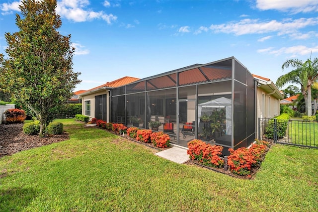 1042 Tuscany Dr, Trinity, FL 34655 - rear view of property with glass enclosure