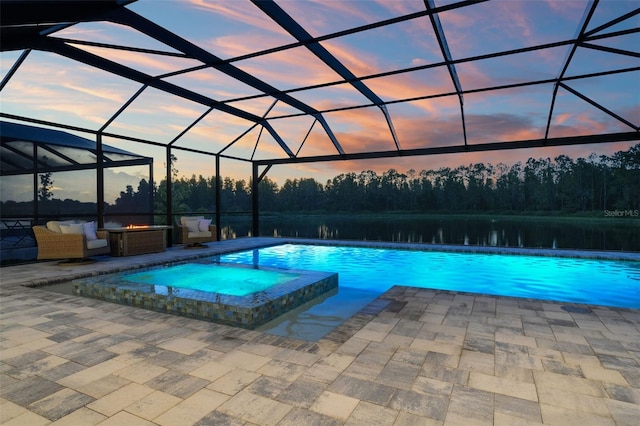 7819 Notched Pine Bnd, Wesley Chapel, FL 33545 - view of pool with a water view, a patio area, a pool with connected hot tub, and a lanai