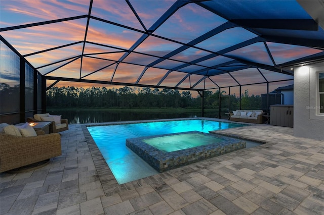 7819 Notched Pine Bnd, Wesley Chapel, FL 33545 - view of pool with a patio area, an outdoor hangout area, a pool with connected hot tub, and a lanai