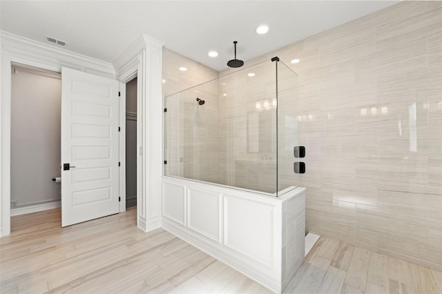 7819 Notched Pine Bnd, Wesley Chapel, FL 33545 - full bathroom featuring walk in shower, recessed lighting, and wood finished floors