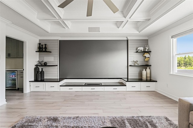 7819 Notched Pine Bnd, Wesley Chapel, FL 33545 - home theater with beverage cooler, coffered ceiling, ornamental molding, light wood-style floors, and beam ceiling