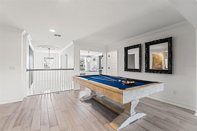 7819 Notched Pine Bnd, Wesley Chapel, FL 33545 - playroom with crown molding, wood finished floors, and pool table