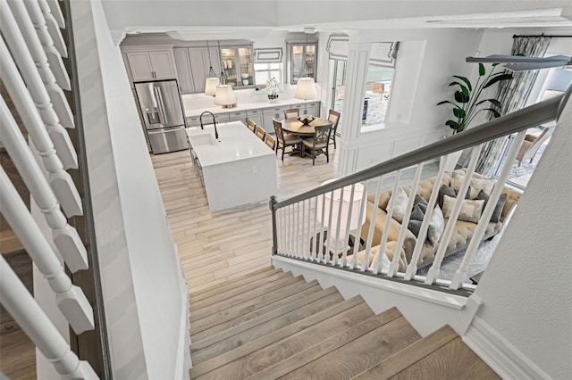 7819 Notched Pine Bnd, Wesley Chapel, FL 33545 - stairs with wood finished floors