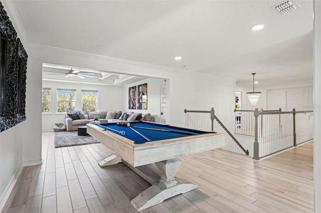 7819 Notched Pine Bnd, Wesley Chapel, FL 33545 - game room featuring plenty of natural light, wood finished floors, crown molding, recessed lighting, and ceiling fan