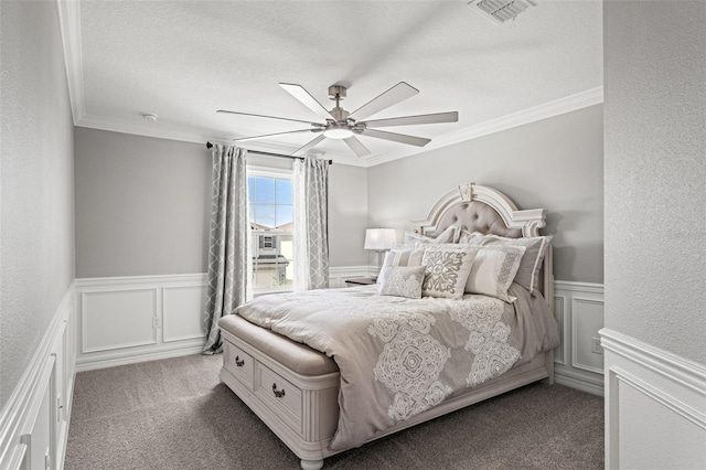 7819 Notched Pine Bnd, Wesley Chapel, FL 33545 - bedroom with ornamental molding, a wainscoted wall, a decorative wall, carpet floors, and ceiling fan