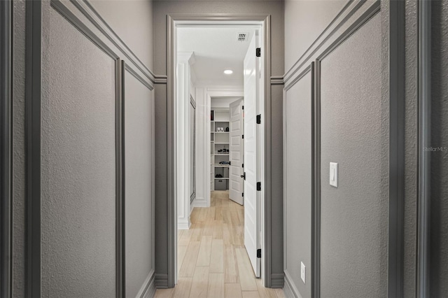 7819 Notched Pine Bnd, Wesley Chapel, FL 33545 - corridor featuring light wood-style floors and recessed lighting