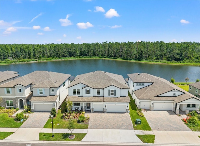 7819 Notched Pine Bnd, Wesley Chapel, FL 33545 - aerial perspective of suburban area with a forest and a large body of water