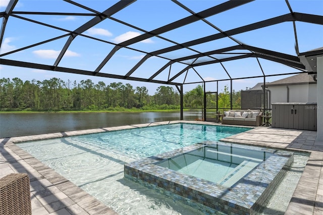 7819 Notched Pine Bnd, Wesley Chapel, FL 33545 - view of pool featuring a water view, a patio area, a pool with connected hot tub, glass enclosure, and an outdoor hangout area