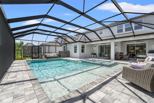 7819 Notched Pine Bnd, Wesley Chapel, FL 33545 - view of pool with a ceiling fan, outdoor lounge area, a patio area, a pool with connected hot tub, and a lanai