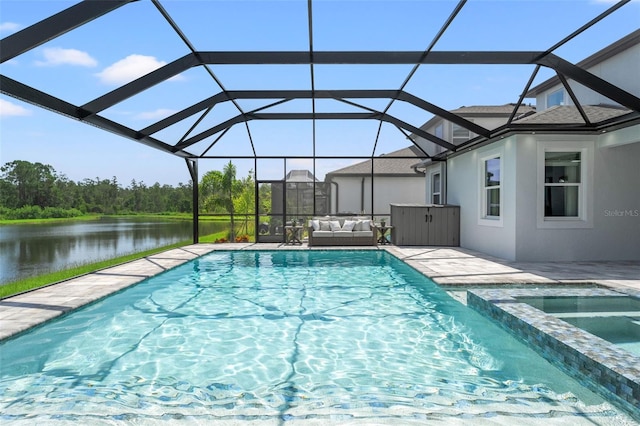 7819 Notched Pine Bnd, Wesley Chapel, FL 33545 - view of pool with a patio area, a water view, a pool with connected hot tub, an outdoor living space, and a lanai
