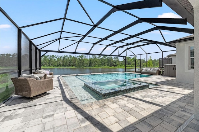 7819 Notched Pine Bnd, Wesley Chapel, FL 33545 - view of pool featuring a patio area, an outdoor hangout area, a water view, and a pool with connected hot tub