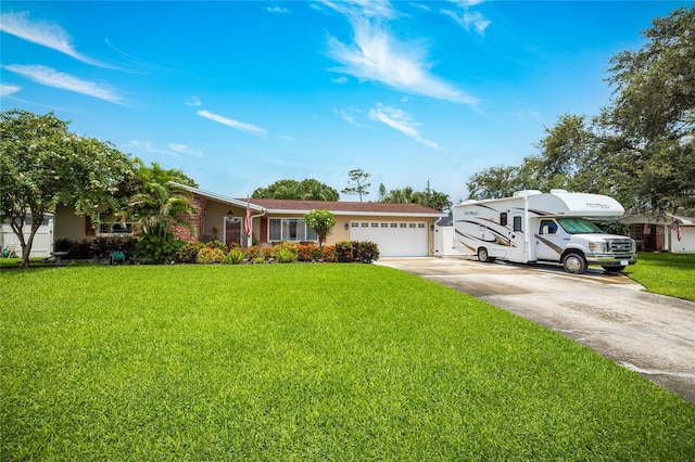 1132 Gershwin Dr, Largo, FL 33771 - single story home with concrete driveway, a garage, a front lawn, and stucco siding
