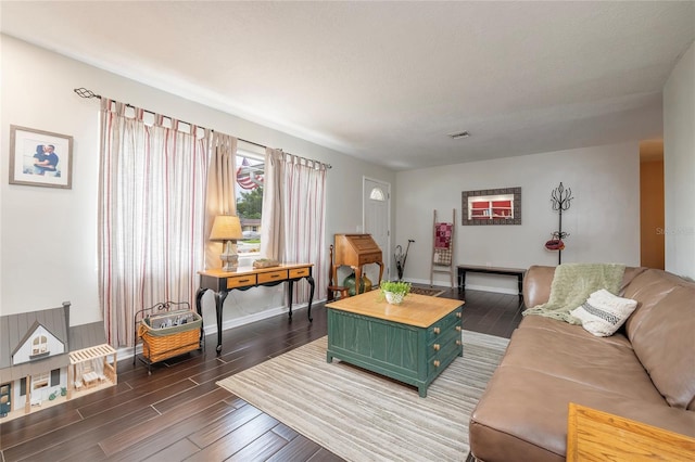1132 Gershwin Dr, Largo, FL 33771 - living room with dark wood-type flooring and baseboards