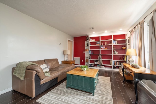 1132 Gershwin Dr, Largo, FL 33771 - living room featuring wood finish floors, recessed lighting, and a textured ceiling