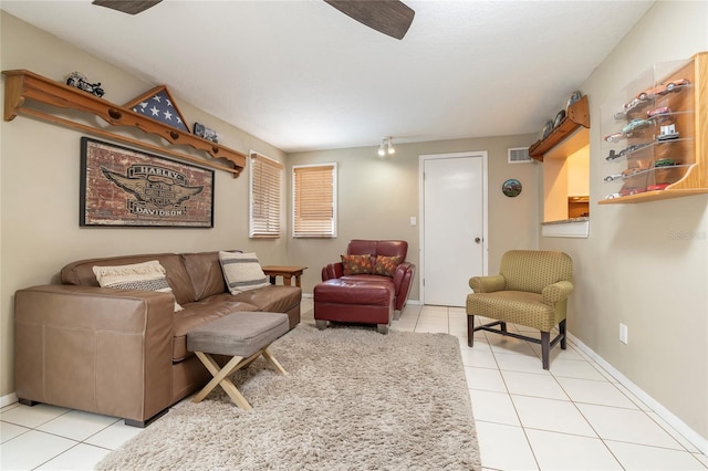 1132 Gershwin Dr, Largo, FL 33771 - living area with tile patterned floors and a ceiling fan