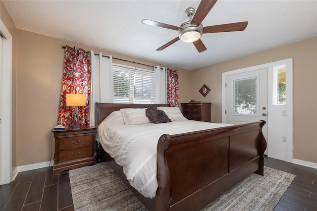 1132 Gershwin Dr, Largo, FL 33771 - bedroom with dark wood-style flooring and ceiling fan