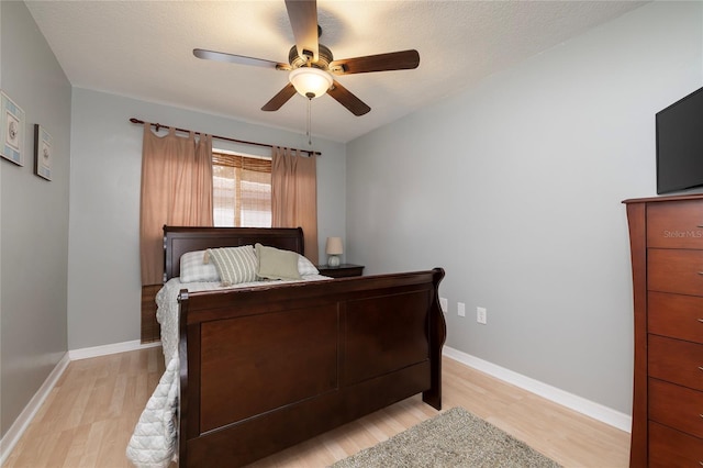1132 Gershwin Dr, Largo, FL 33771 - bedroom with light wood-style floors and a ceiling fan