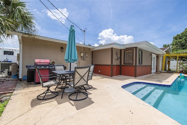 1132 Gershwin Dr, Largo, FL 33771 - view of pool with a patio and a grill