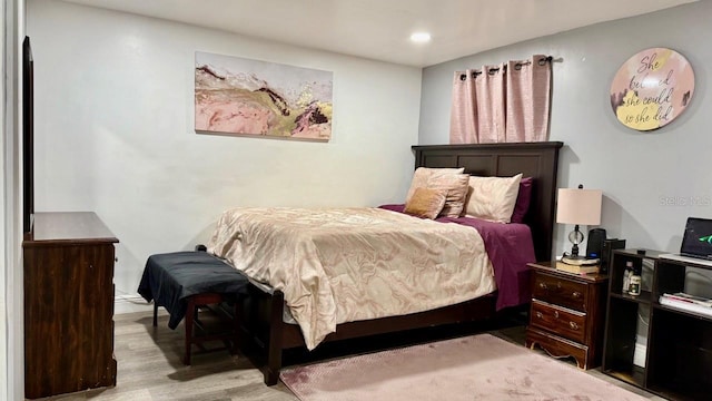 2813 W Kenmore Ave, Tampa, FL 33614 - bedroom with wood finished floors and recessed lighting