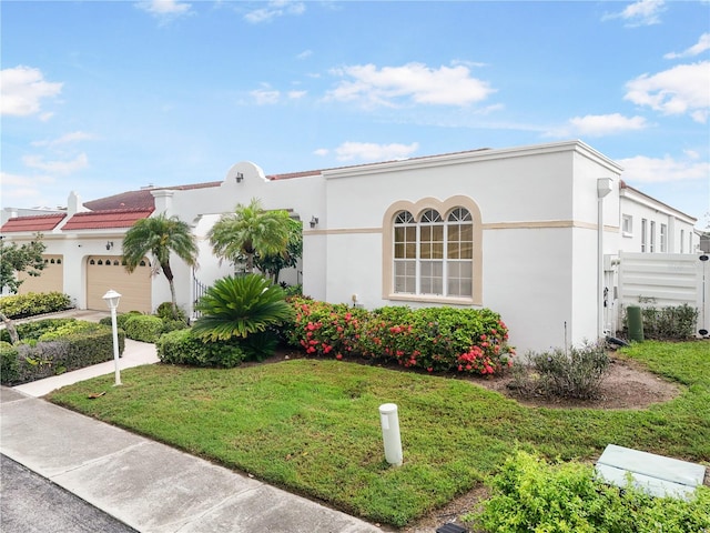 4719 61st Avenue Terrace W Unit 4719, Bradenton, FL 34210 - mediterranean / spanish-style house featuring a garage and stucco siding