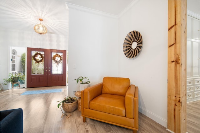 4719 61st Avenue Terrace W Unit 4719, Bradenton, FL 34210 - entryway featuring french doors, wood finished floors, and crown molding