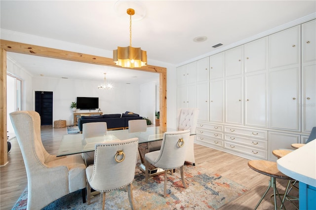 4719 61st Avenue Terrace W Unit 4719, Bradenton, FL 34210 - dining space featuring a chandelier and wood finished floors