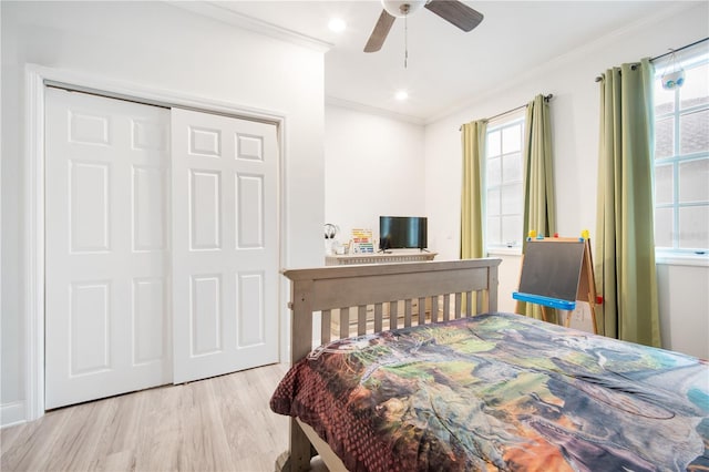 4719 61st Avenue Terrace W Unit 4719, Bradenton, FL 34210 - bedroom with crown molding, multiple windows, wood finished floors, and ceiling fan