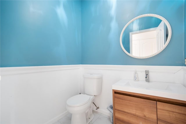 4719 61st Avenue Terrace W Unit 4719, Bradenton, FL 34210 - bathroom with vanity, a wainscoted wall, and tile patterned flooring