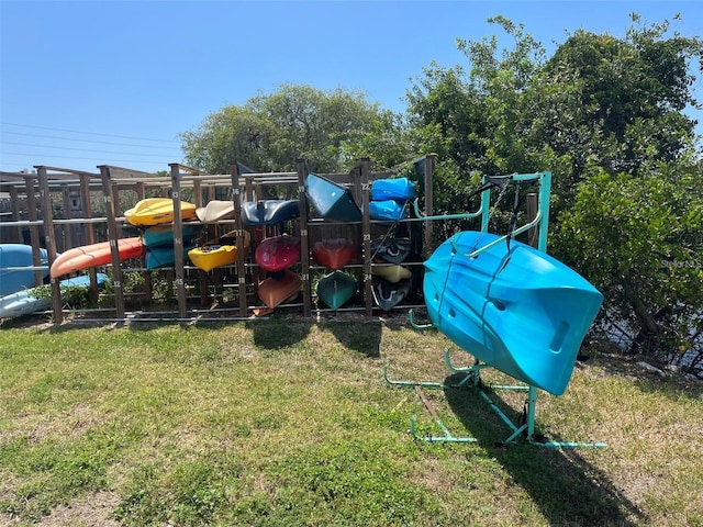 4901 Onyx Ln Unit 204, New Port Richey, FL 34652 - view of jungle gym with a lawn