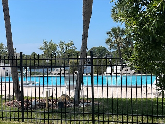 4901 Onyx Ln Unit 204, New Port Richey, FL 34652 - community pool featuring a patio area