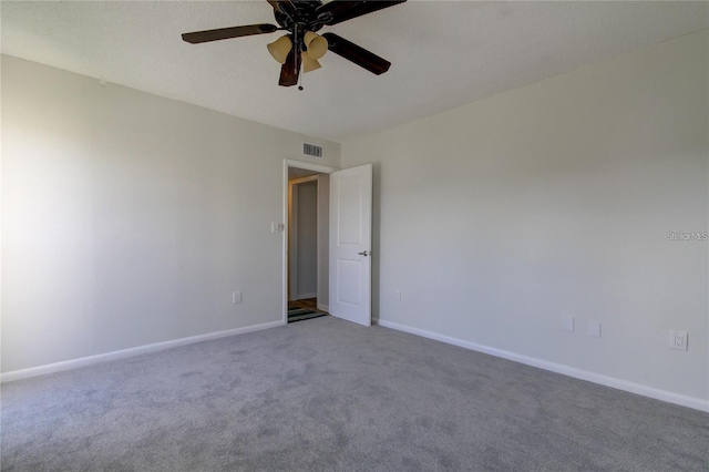 4901 Onyx Ln Unit 204, New Port Richey, FL 34652 - carpeted spare room with a ceiling fan and baseboards