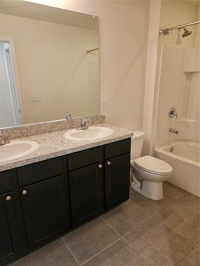 10124 Mangrove Well Rd, Ruskin, FL 33573 - bathroom with double vanity, tile patterned floors, and bathing tub / shower combination