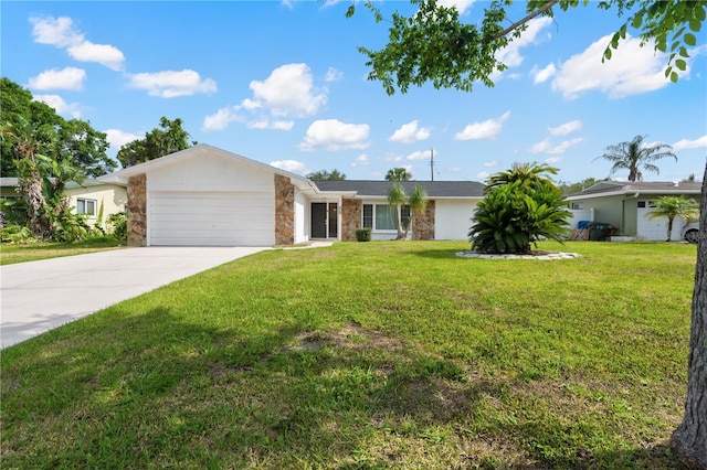 1720 Patlin Cir N, Largo, FL 33770 - ranch-style home with stone siding, a garage, driveway, and a front lawn