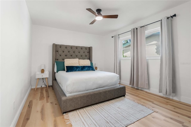 1720 Patlin Cir N, Largo, FL 33770 - bedroom with wood finished floors and a ceiling fan