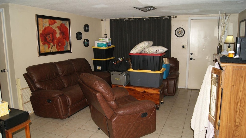 7705 Embassy Blvd, Port Richey, FL 34668 - living room featuring tile patterned floors