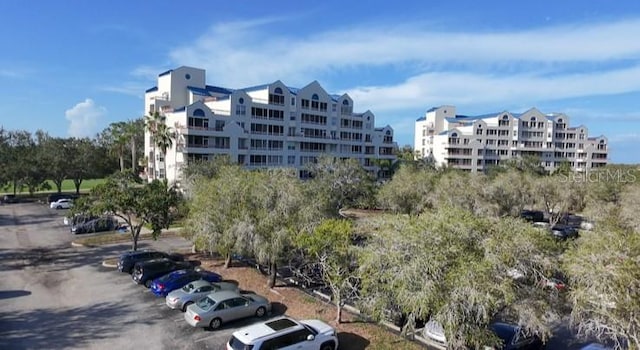 2333 Feather Sound Dr Unit A607, Clearwater, FL 33762 - view of building exterior with uncovered parking